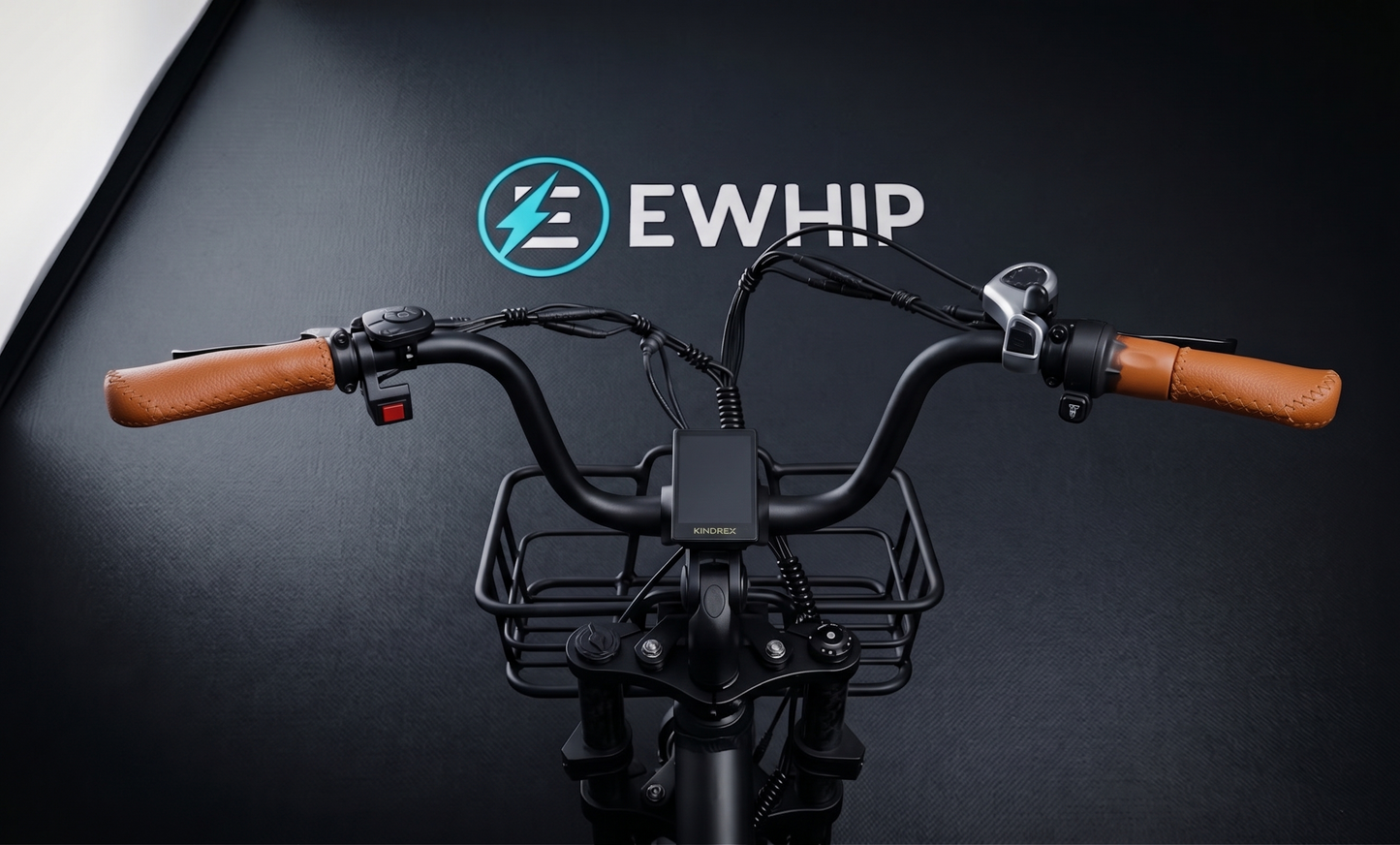 Bicycle handlebar with wooden grips and a basket on a black background with EWHIP logo.