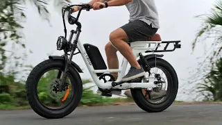 Riding a stylish street-legal e-bike with Samsung-powered battery on a scenic road