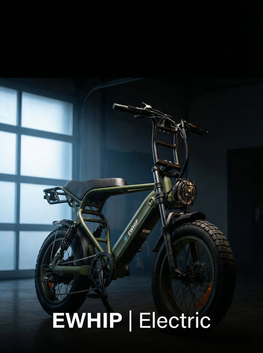 Olive green EWHIP electric bike with fat tires, front headlight, and rear rack in a studio setting