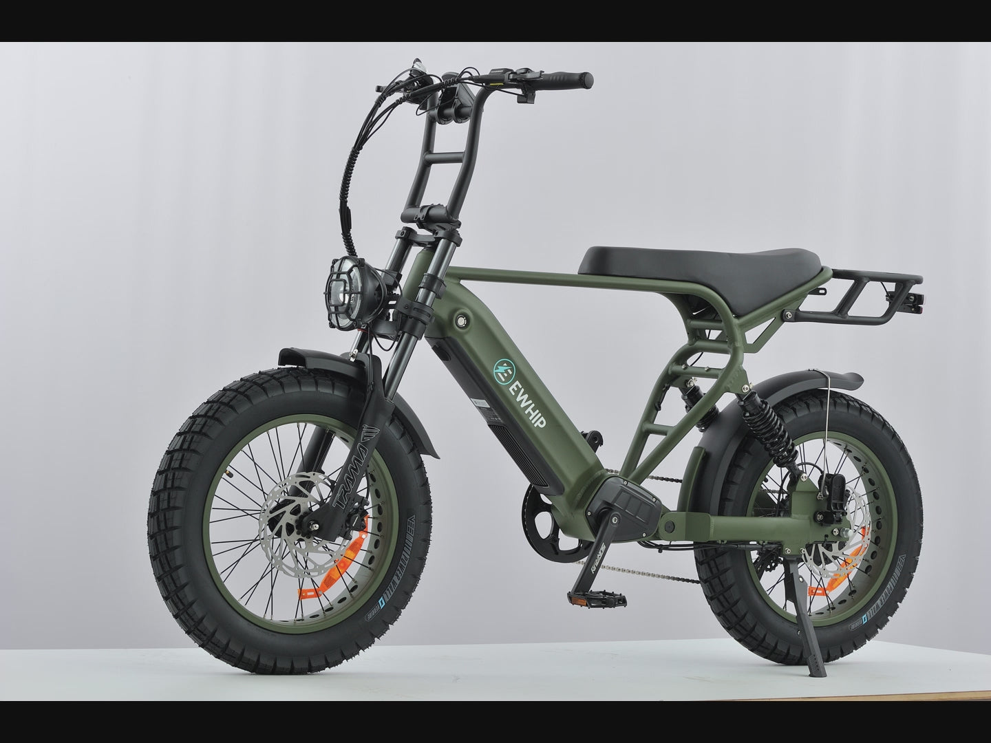 Video montage featuring close-up details of The Boom ebike components and green finish